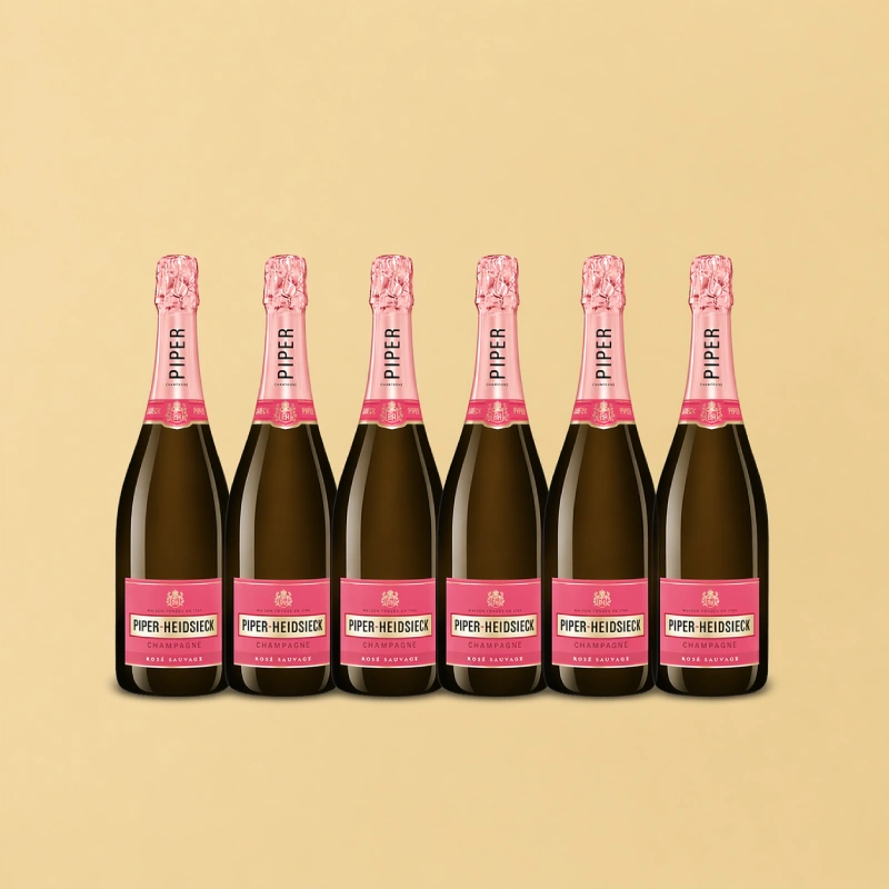 Zes flessen Piper-Heidsieck Rosé Sauvage champagne naast elkaar